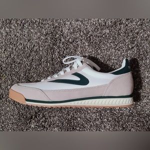 Green, white and tan Tretorn sneakers